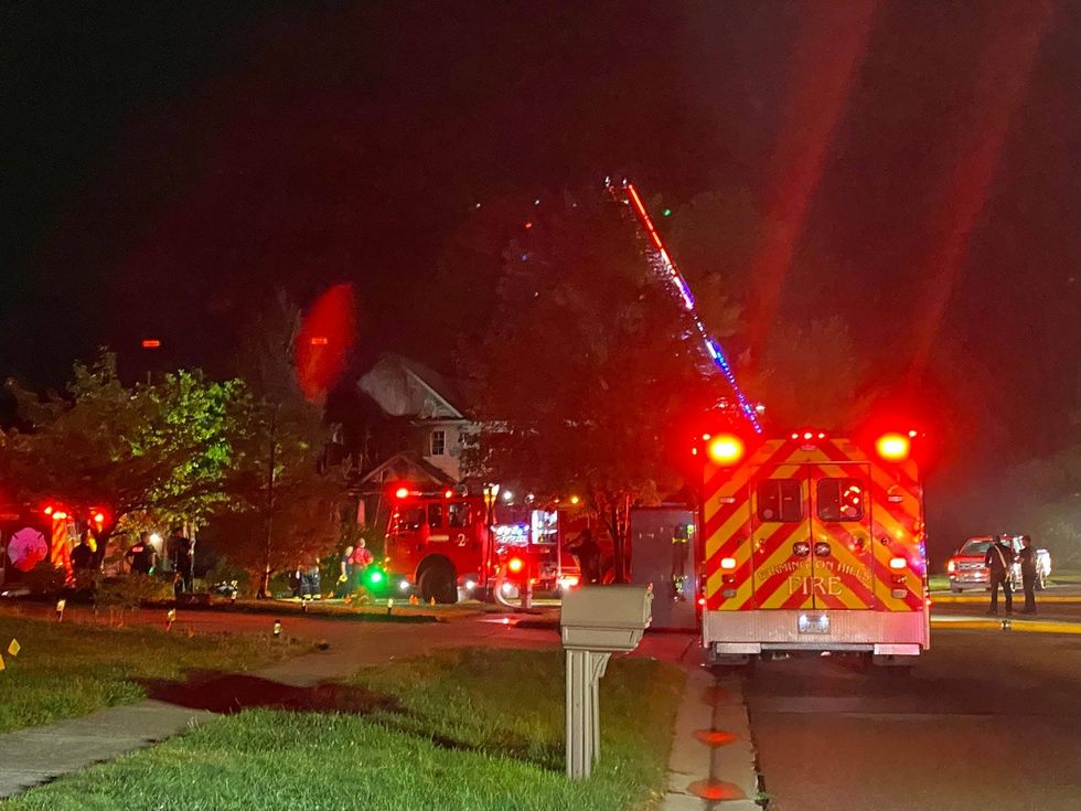 Farmington Hills Fire Department fighting house fire