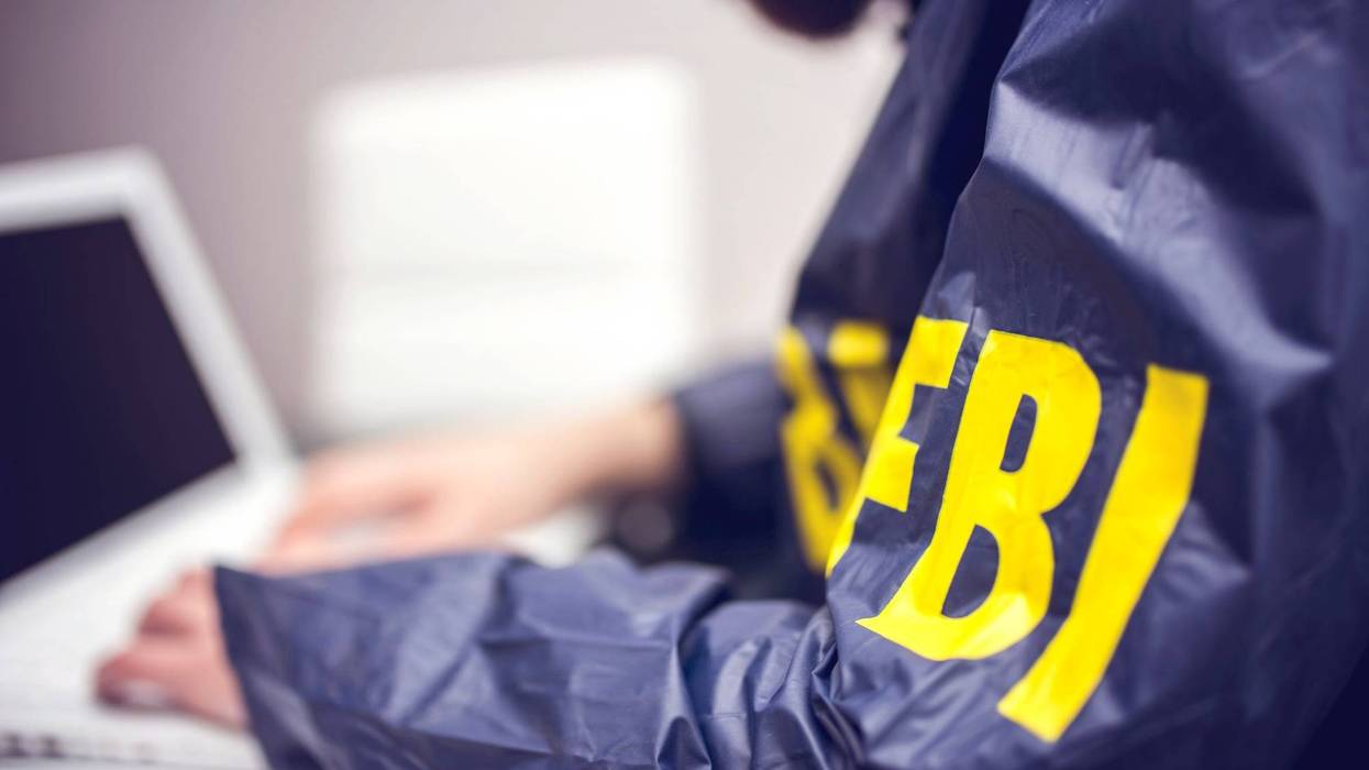 FBI Agent on a computer
