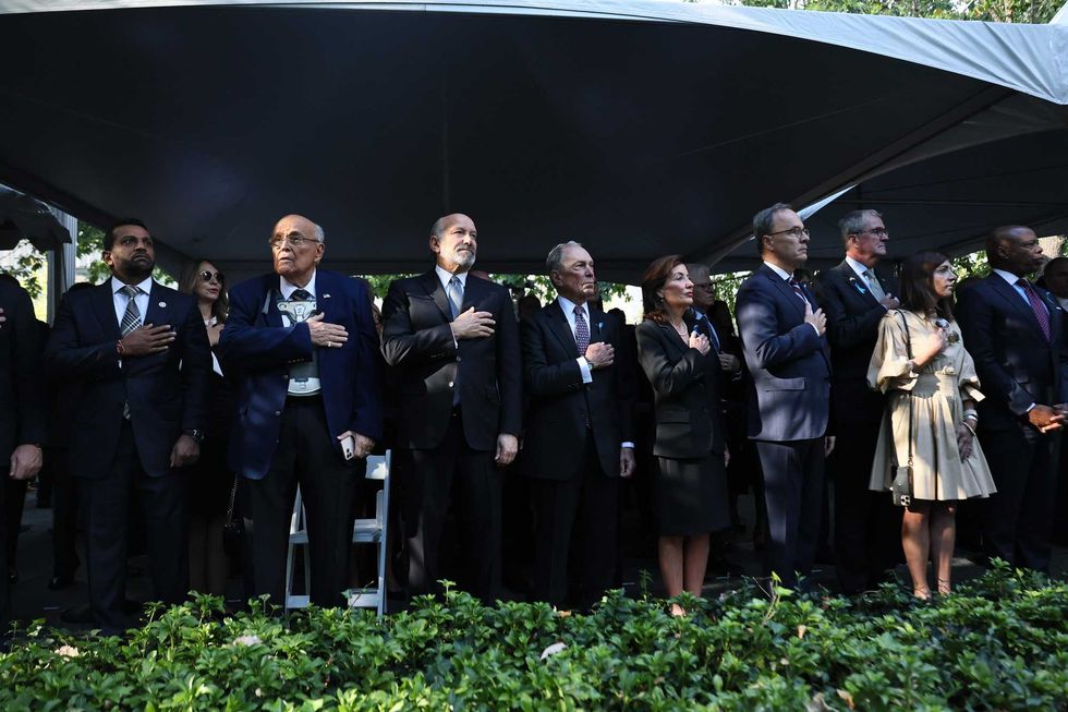 FBI Director Kash Patel, former NYC Mayor Rudy Giuliani, U.S. Secretary of Commerce Howard Lutnick, Former NYC Mayor Michael Bloomberg, Gov. Kathy Hochul, William Hochul Jr., New Jersey Gov. Phil Murphy, Tammy Murphy and NYC Mayor Eric Adams attend the annual 9/11 Commemoration Ceremony at the National 9/11 Memorial and Museum on September 11, 2025 in New York City
