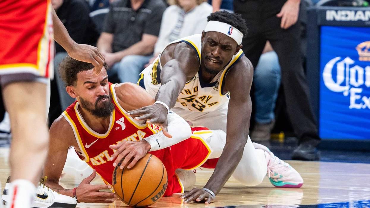 Feb 1, 2025; Indianapolis, Indiana, USA; Atlanta Hawks guard Trae Young (11) and Indiana Pacers forward Pascal Siakam (43) dive for a loose ball in the second half at Gainbridge Fieldhouse. Mandatory Credit: Trevor Ruszkowski-Imagn Images