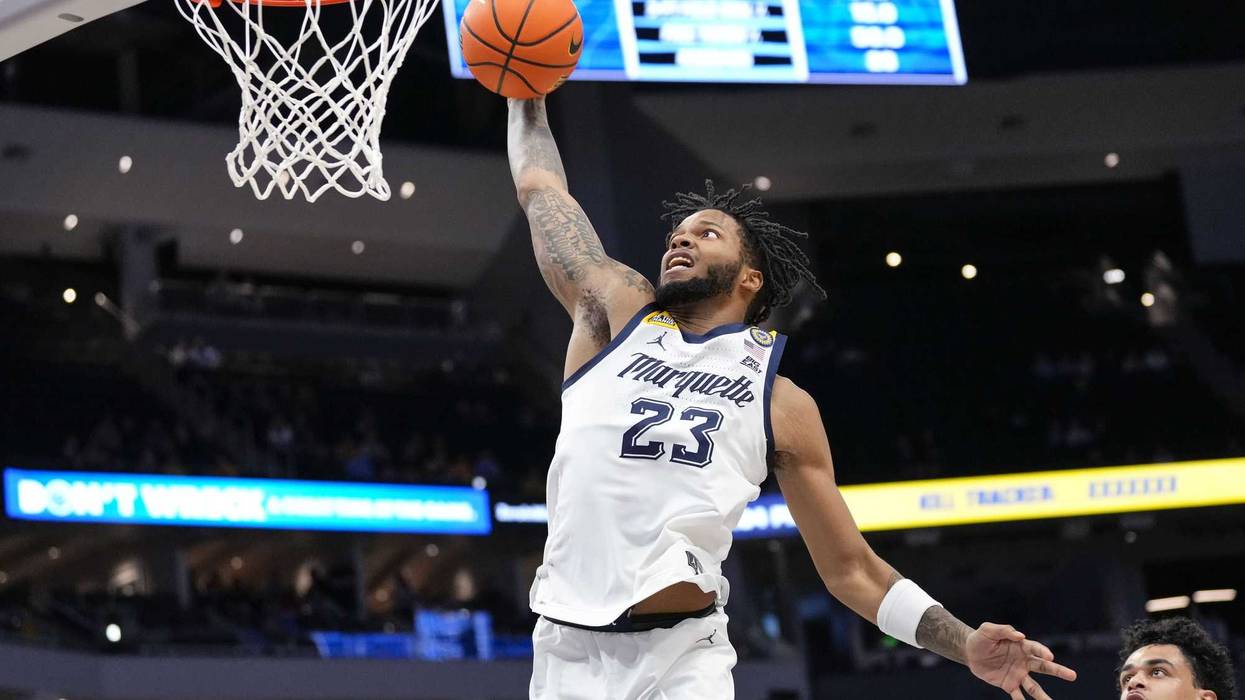 Feb 11, 2025; Milwaukee, Wisconsin, USA; Marquette Golden Eagles forward David Joplin (23) tries for a slam dunk during the second half against the DePaul Blue Demons at Fiserv Forum. Mandatory Credit: Jeff Hanisch-Imagn Images