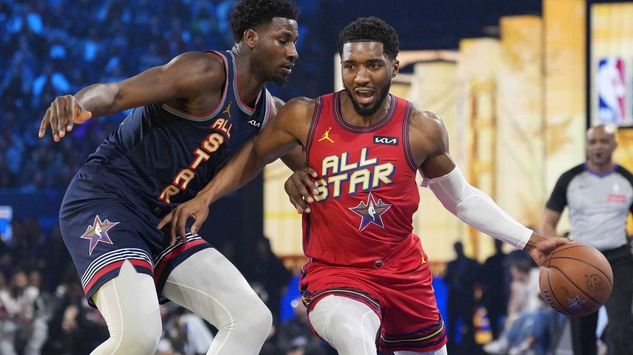 Feb 16, 2025; San Francisco, CA, USA; Chuck’s Global Stars guard Donovan Mitchell (5) of the Cleveland Cavaliers controls the ball against Kenny’s Young Stars forward Jaren Jackson Jr. (13) of the Memphis Grizzlies during the 2025 NBA All Star Game at Chase Center.