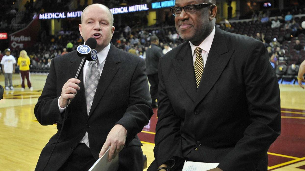 Feb 17, 2012; Cleveland, OH, USA; Television personalities Jeff Phelps (left) and Campy Russell before a game with the Miami Heat at the Cleveland Cavaliers at Quicken Loans Arena. Mandatory Credit: David Richard-USA TODAY Sports