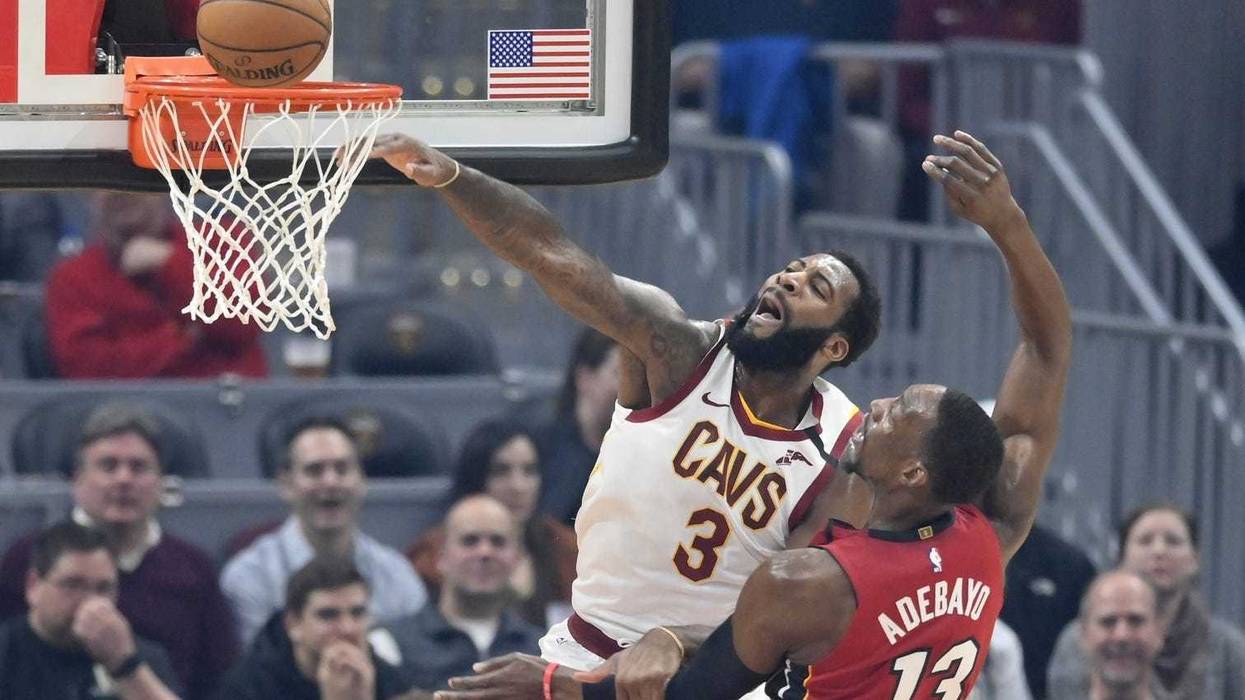 Feb 24, 2020; Cleveland, Ohio, USA; Cleveland Cavaliers center Andre Drummond (3) misses a dunk beside Miami Heat forward Bam Adebayo (13) in the first quarter at Rocket Mortgage FieldHouse. Mandatory Credit: David Richard-USA TODAY Sports