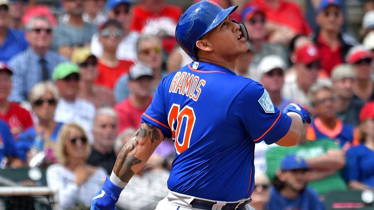 Feb 28, 2019; Jupiter, FL, USA; New York Mets catcher Wilson Ramos (40) connects for a base hit against the St. Louis Cardinals at Roger Dean Chevrolet Stadium. Mandatory Credit: Steve Mitchell-USA TODAY Sports