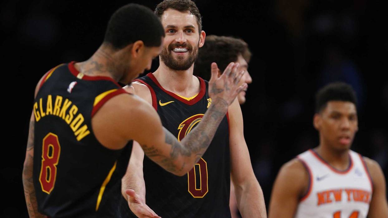 Feb 28, 2019; New York, NY, USA; Cleveland Cavaliers forward Kevin Love (0) and Cleveland Cavaliers guard Jordan Clarkson (8) celebrate during the second half against the New York Knicks at Madison Square Garden. Mandatory Credit: Noah K. Murray-USA TODAY