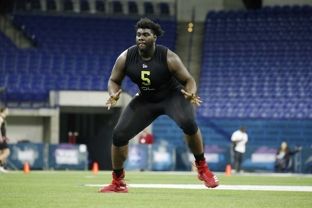 Feb 28, 2020; Indianapolis, Indiana, USA; Louisville Cardinals offensive lineman Mekhi Becton (OL05) goes through workout drills during the 2020 NFL Combine at Lucas Oil Stadium. Mandatory Credit: Brian Spurlock-USA TODAY Sports