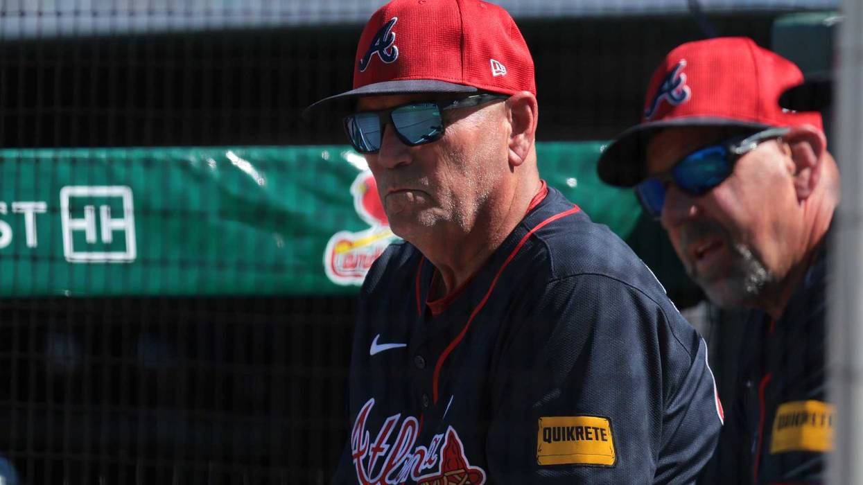 Feb 28, 2025; Jupiter, Florida, USA; Atlanta Braves manager Brian Snitker (43) watches the game against the Miami Marlins during the fifth inning at Roger Dean Chevrolet Stadium. Mandatory Credit: Sam Navarro-Imagn Images