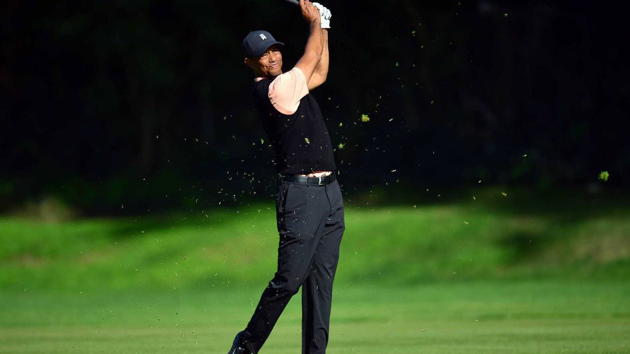 February 13, 2020; Pacific Palisades, California, USA; Tiger Woods hits on the twelfth hole fairway during the first round of the The Genesis Invitational golf tournament at Riviera Country Club. Mandatory Credit: Gary A. Vasquez-USA TODAY Sports