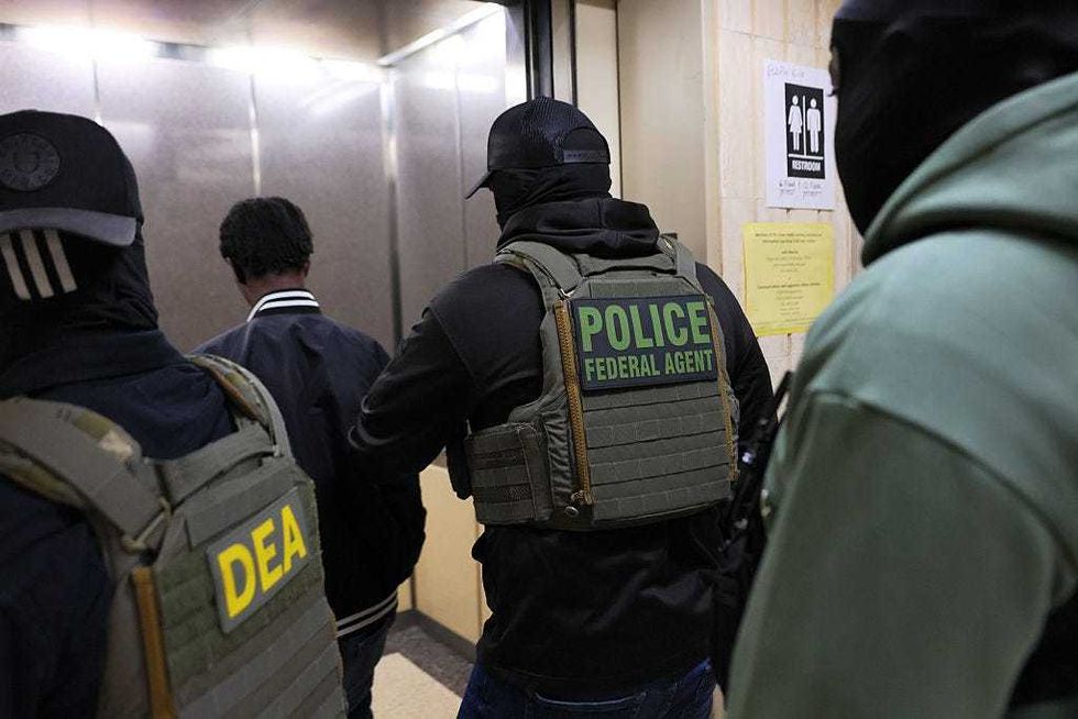 Federal agents detain an individual after his hearing in immigration court at the Jacob K. Javitz Federal Building on June 10, 2025 in New York City.
