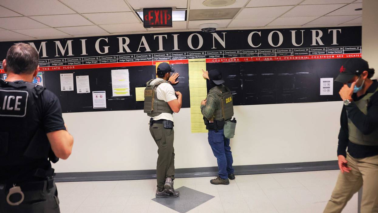 Federal agents patrol the halls of immigration court at the Jacob K. Javitz Federal Building on June 9, 2025