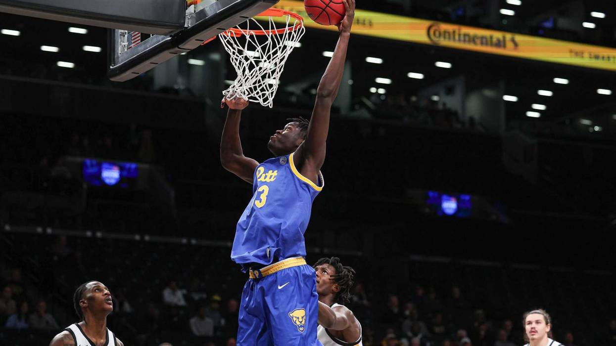 Federiko Federiko laying the ball in