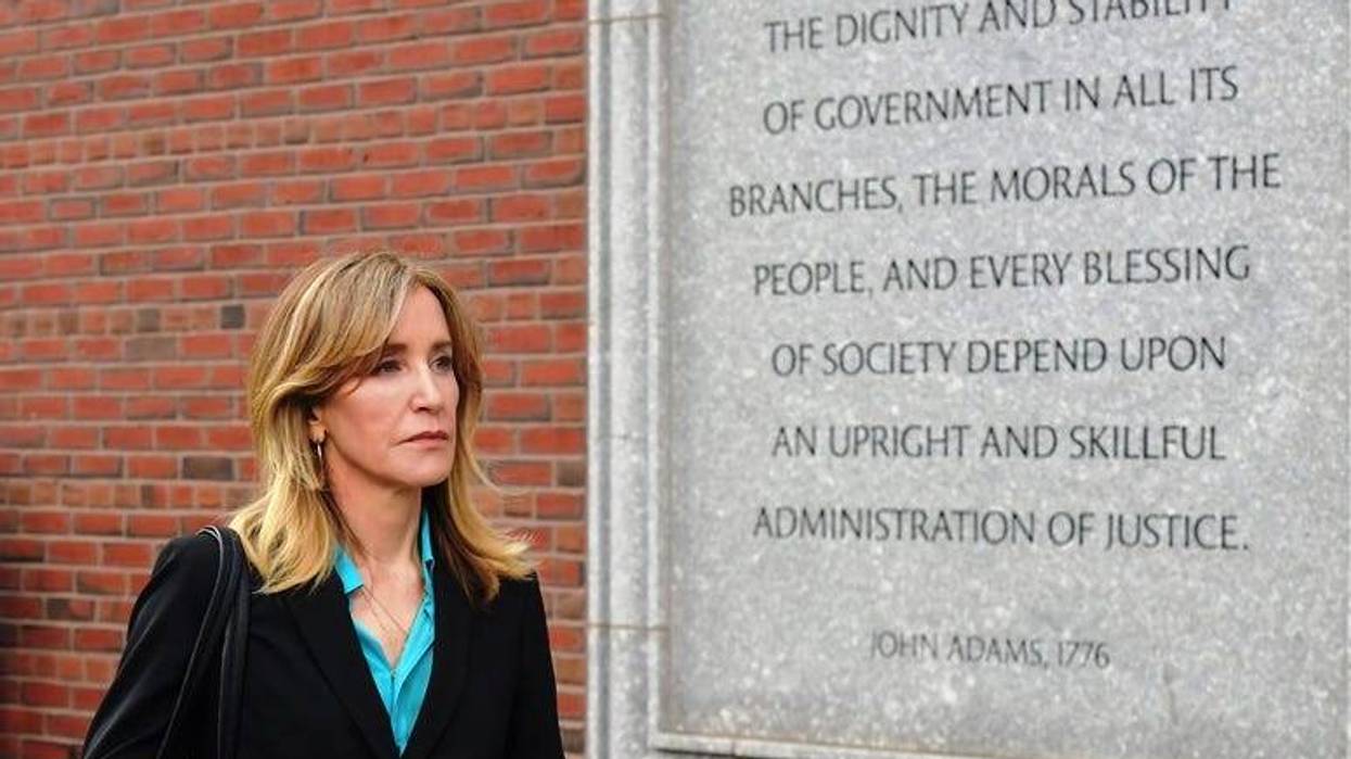 Felicity Huffman exits the John Joseph Moakley U.S. Courthouse after appearing in Federal Court to answer charges stemming from college admissions scandal on April 3, 2019