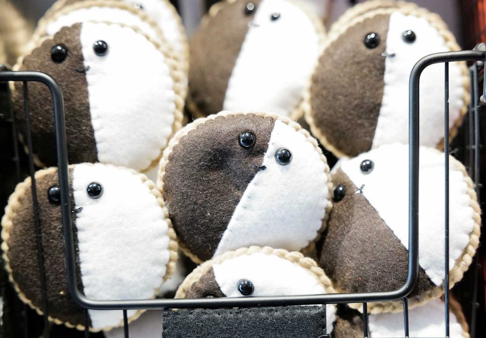 Felt black and white cookies are pictured on display as part of the "Feltz Bagels" art installation created by British artist Lucy Sparrow Monday, Oct. 2, 2023, in New York