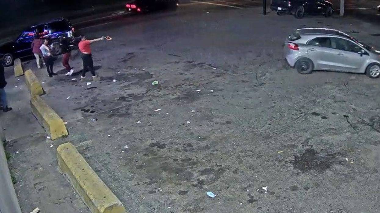 female suspect opens fire at a car