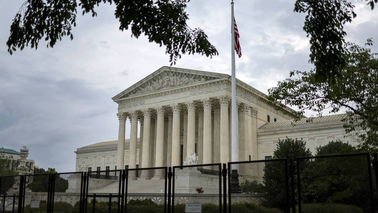 Fencing surrounds the U.S. Supreme Court as it nears the end of its term, June 27, 2022 in Washington, DC.