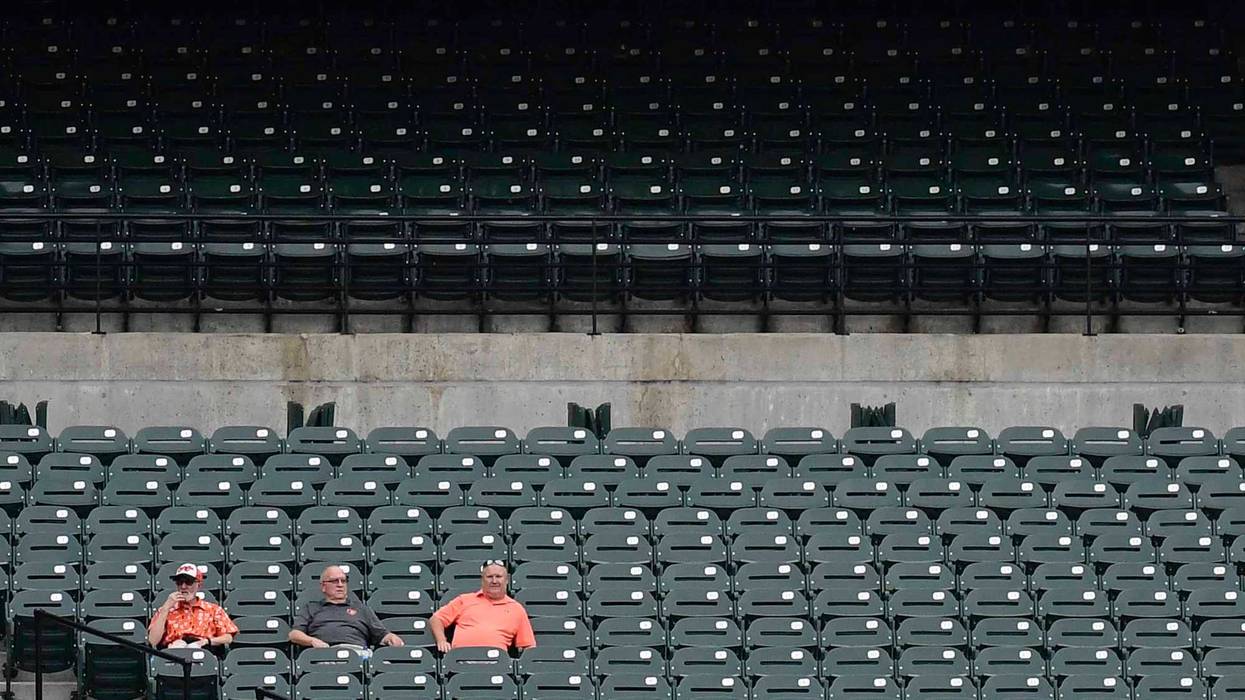 Few fans show up to watch an Orioles game at Camden Yards.
