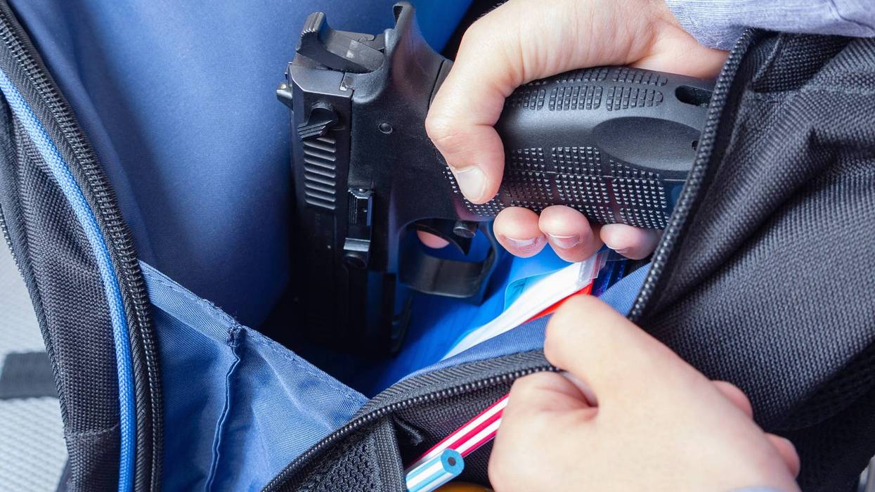 FILE: A handgun in bag.