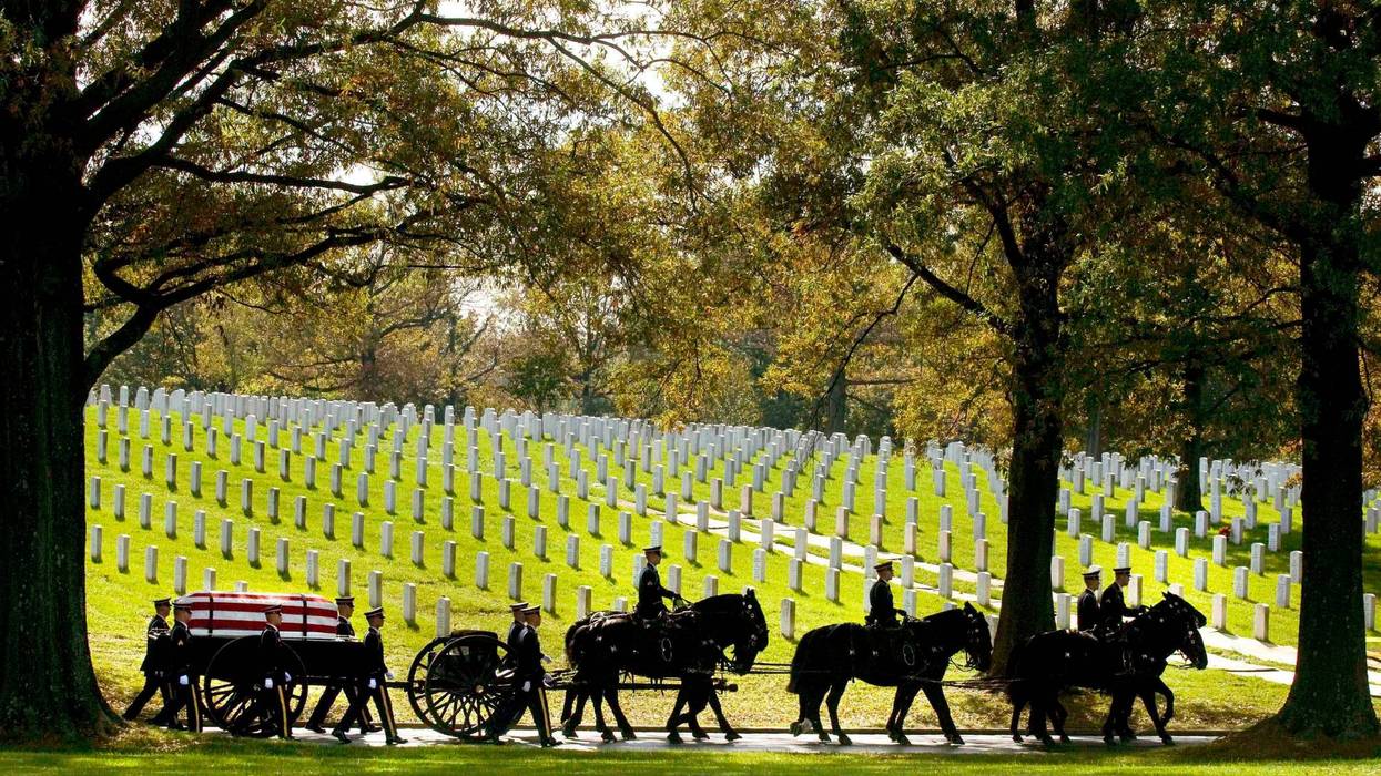 FILE - A U.S. Army Caisson team carries the remains of Army Pfc. Tramaine J. Billingsley during burial services at Arlington National Cemetery in Arlington, Va., Nov. 2, 2010.