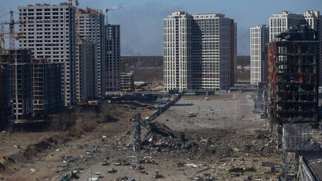 FILE - A view to the site of an explosion as a result of a missile strike into the shopping mall on March 21, 2022 in Kyiv, Ukraine. As Russia's advance on Kyiv has largely stalled, the Ukrainian capital has continued to be hit by missiles and shellfire. More than three million people have fled Ukraine since Russia launched its large-scale invasion of the country on Feb. 24.