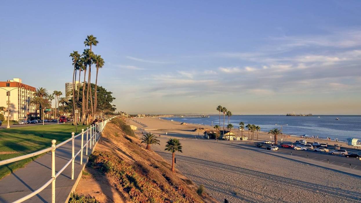 FILE - An undated photo of coastal Long Beach, Calif. at sunset, with sandy beaches and the blue Pacific ocean.