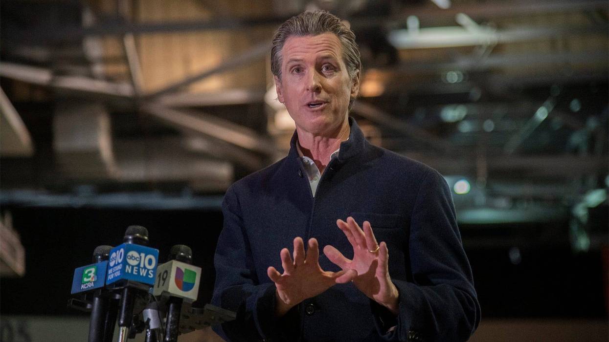 FILE - California Governor Gavin Newsom speaks at a press conference after touring the Stockton Vaccination Hub at the Stockton Arena in downtown Stockton, Calif. on Thursday, April 14, 2021.