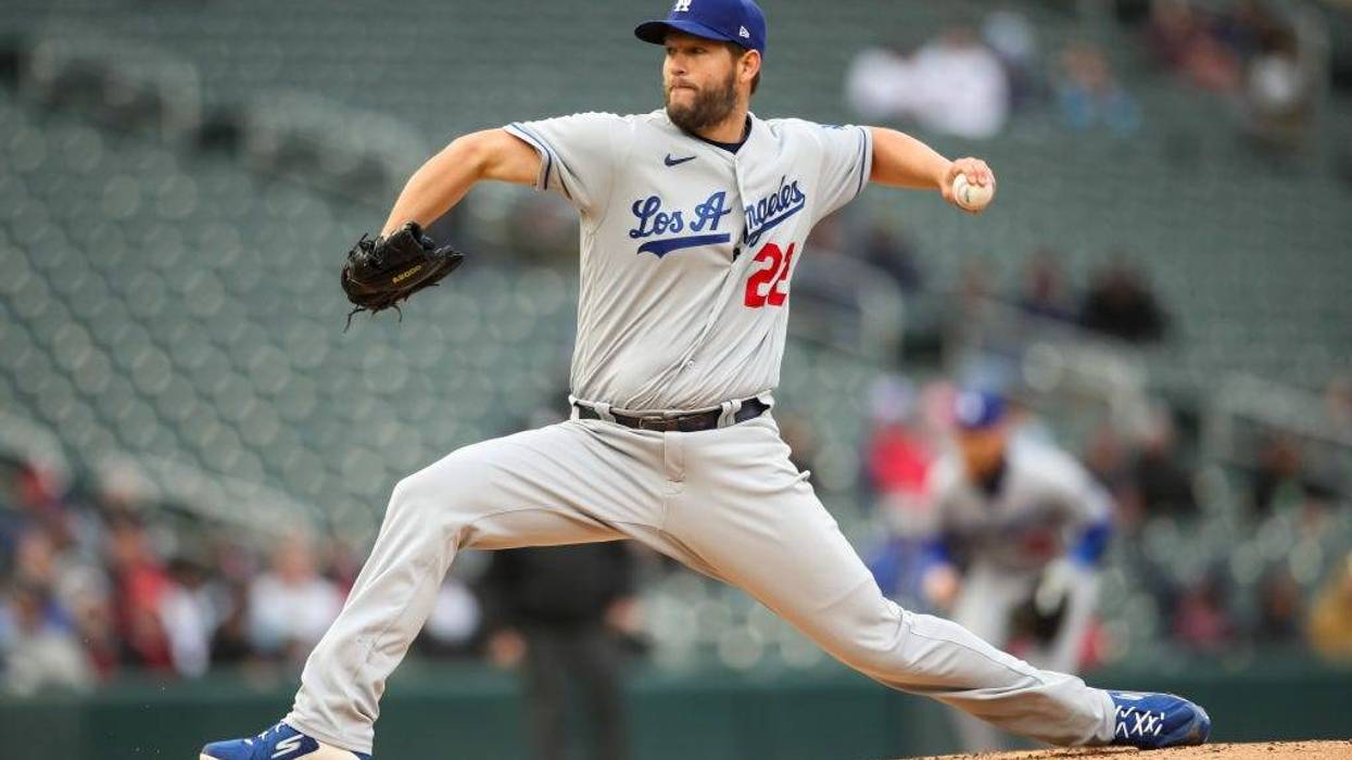 FILE - Clayton Kershaw #22 of the Los Angeles Dodgers delivers a pitch against the Minnesota Twins in the first inning of the game at Target Field on April 13, 2022 in Minneapolis, Minn.