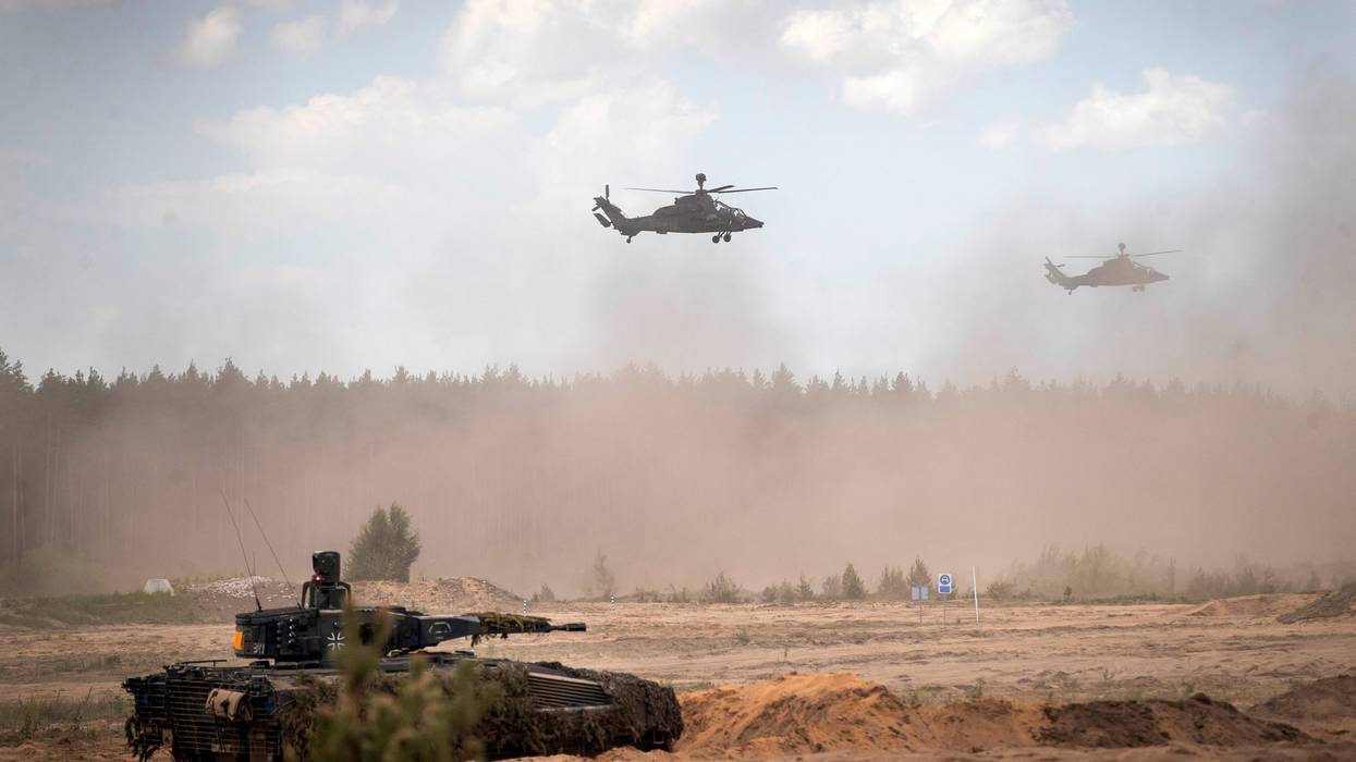 FILE - Eurocopters Tiger of the German Army take part in the Lithuanian-German division-level international military exercise 'Grand Quadriga 2024' at a training range in Pabrade, north of the capital Vilnius, Lithuania on May 29, 2024