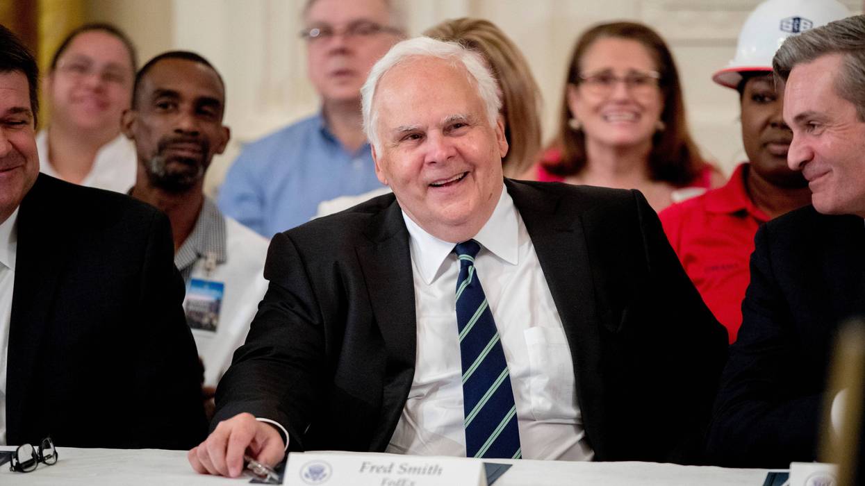 FILE - FedEx CEO Fred Smith appears at a signing ceremony where President Donald Trump signed an Executive Order that establishes a National Council for the American Worker in the East Room of the White House, Thursday, July 19, 2018, in Washington.