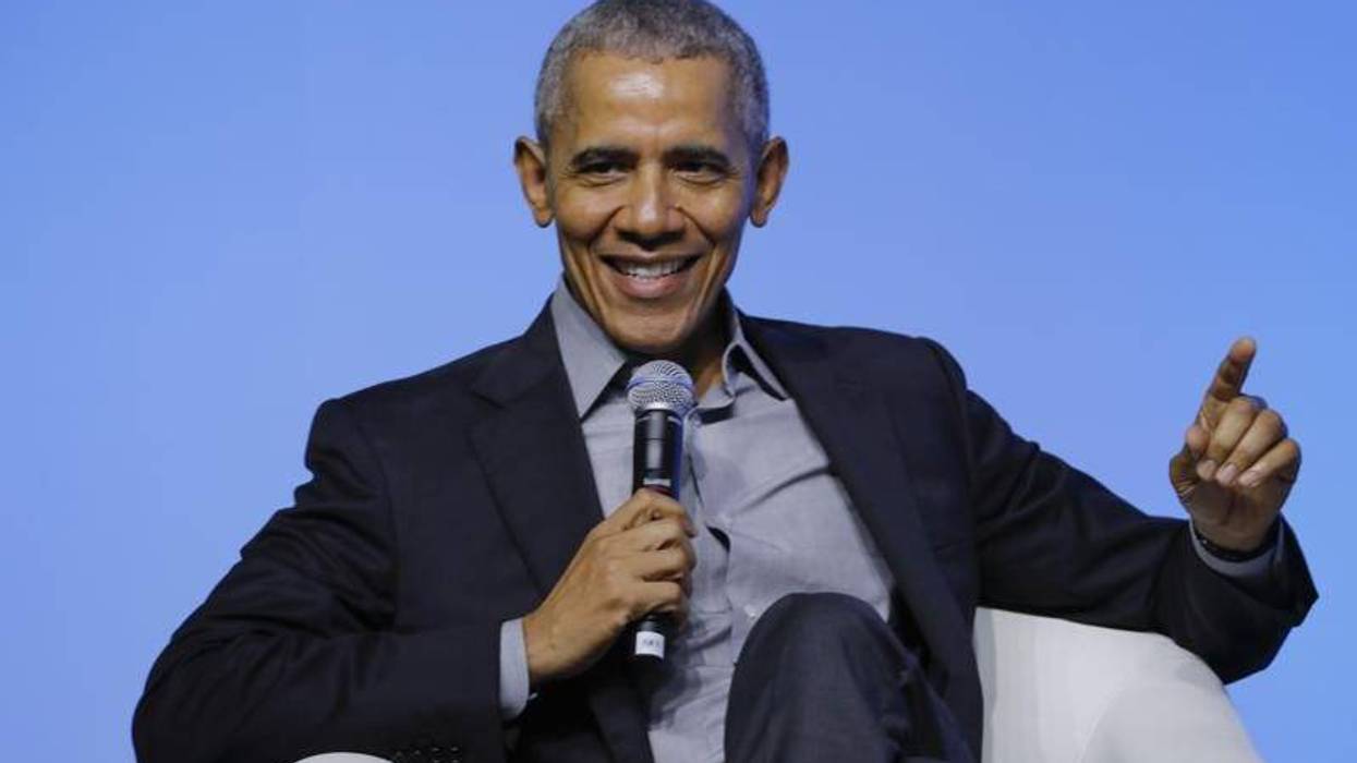 FILE - Former U.S. President Barack Obama gesture as he attends the "values-based leadership" during a plenary session of the Gathering of Rising Leaders in the Asia Pacific, organized by the Obama Foundation in Kuala Lumpur, Malaysia, on Dec. 13, 2019. Obama’s memoir “Dreams from My Father” will be released in a young adult edition on October 5. Obama had yet to hold any political office when “Dreams from My Father” was released in 1995.