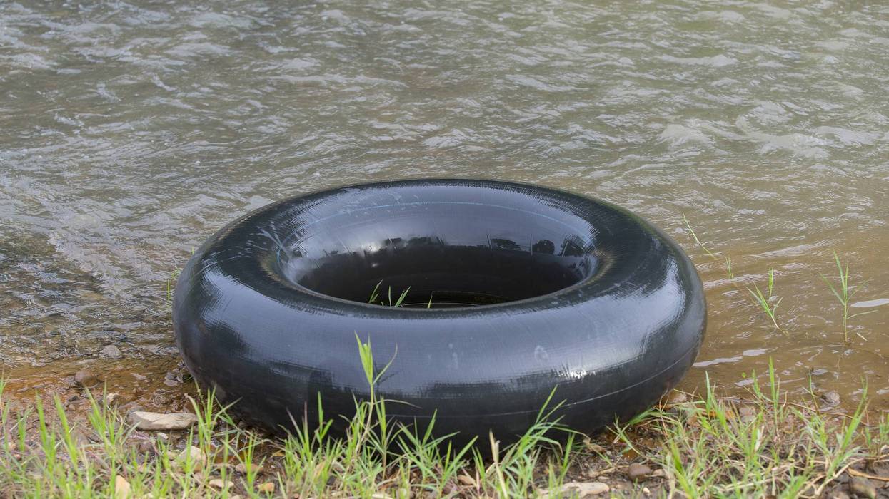 File images of a tube on the side of a river