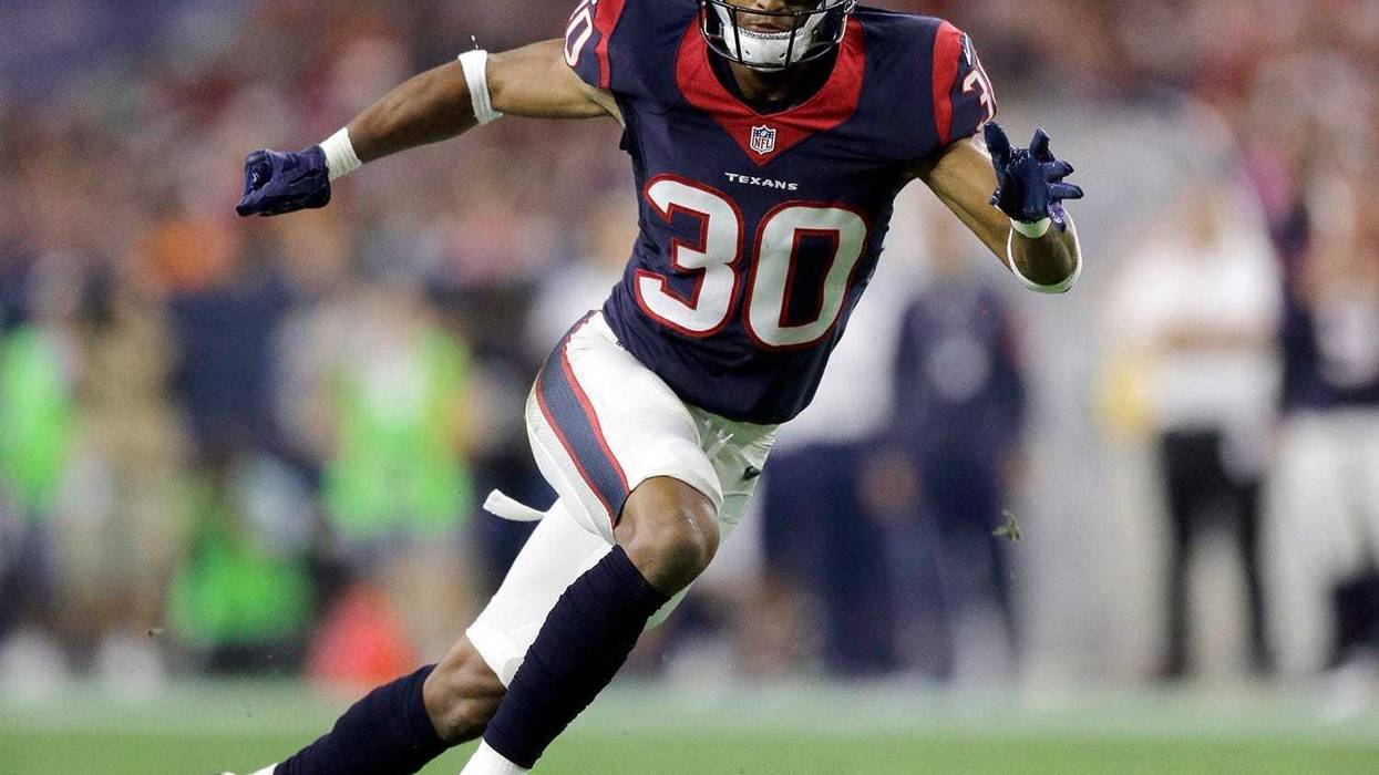 FILE - In this Aug. 22, 2015, file photo, Houston Texans' Kevin Johnson (30) chases a play during the first half of an NFL preseason football game against the Denver Broncos in Houston. Johnson is scheduled to meet with the Browns, a person familiar with
