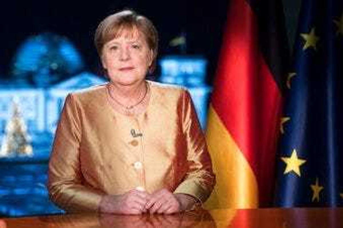 FILE - In this Dec. 30, 2020 file photo German Chancellor Angela Merkel poses for photographs after the television recording of her annual New Year's speech at the chancellery in Berlin, Germany. (AP Photo/Markus Schreiber, File)