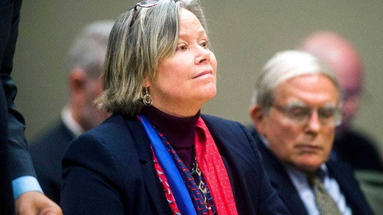 FILE - In this Dec. 7, 2018 file photo, former Michigan state medical executive Dr. Eden Wells appears in Flint, Mich. Wells, was charged. (Jake May/The Flint Journal via AP)