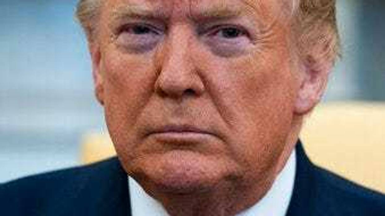 FILE - In this Jan. 27, 2020, file photo President Donald Trump listens during a meeting with Israeli Prime Minister Benjamin Netanyahu in the Oval Office of the White House. (AP Photo/ Evan Vucci)