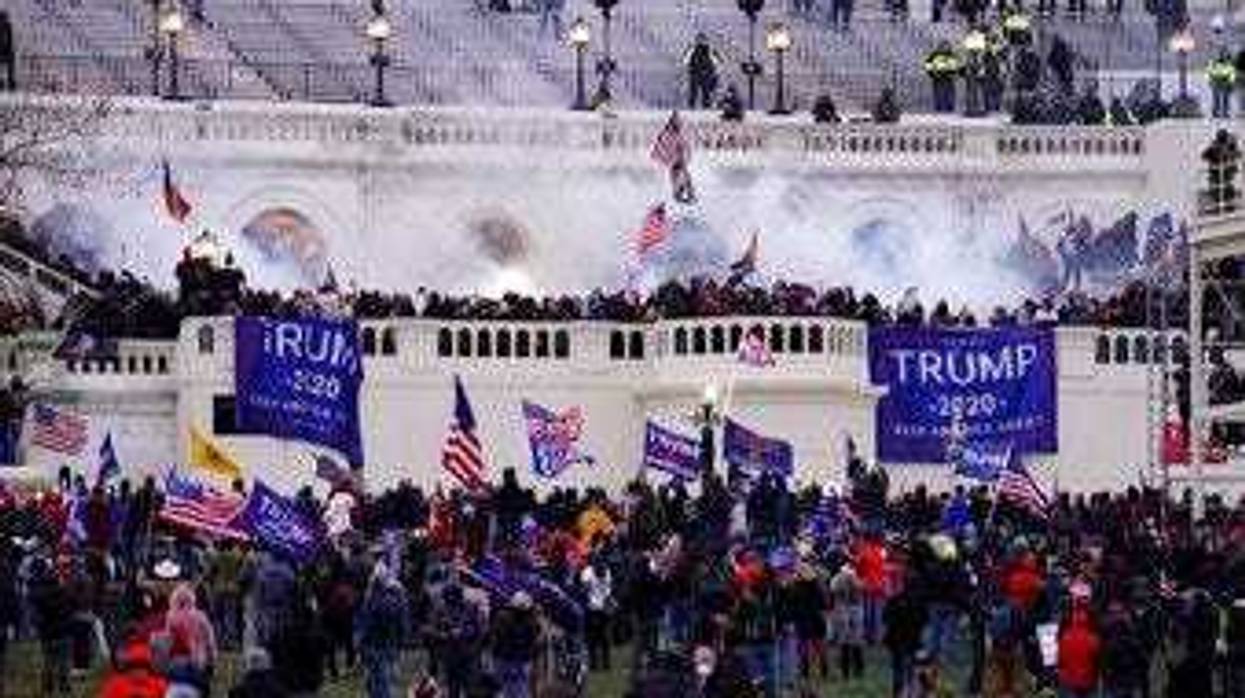 FILE - In this Jan. 6, 2021, file photo violent rioters, loyal to President Donald Trump, storm the Capitol in Washington. (AP Photo/John Minchillo, File)