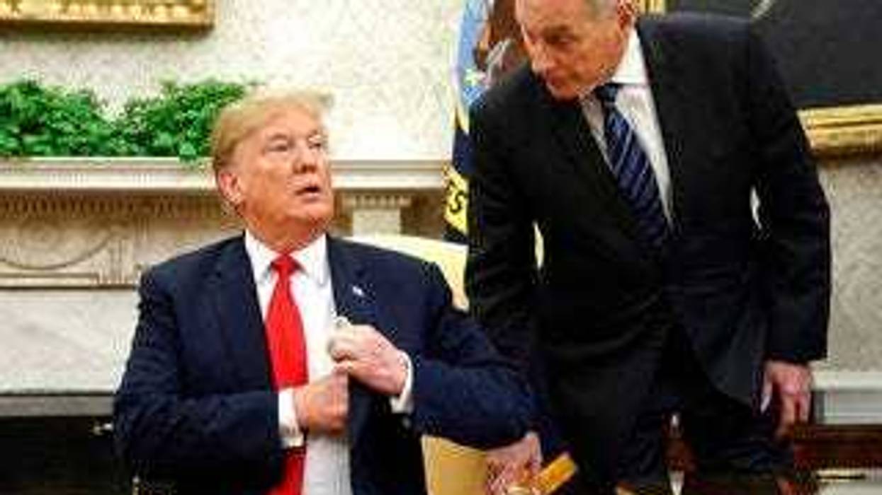 FILE - In this June 27, 2018 file photo, White House Chief of Staff John Kelly, right, leans in to talk with President Donald Trump during Trump's meeting with Portuguese President Marcelo Rebelo de Sousa. (AP Photo/Pablo Martinez Monsivais)