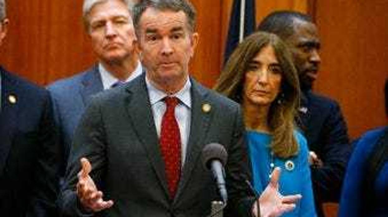 FILE - In this March 12, 2020 file photo, Virginia Gov. Ralph Northam gestures during a news conference as House speaker Eileen Filler-Corn and Secretary of Public safety Brian Moran look on at the State Capitol. (AP Photo/Steve Helber, File)