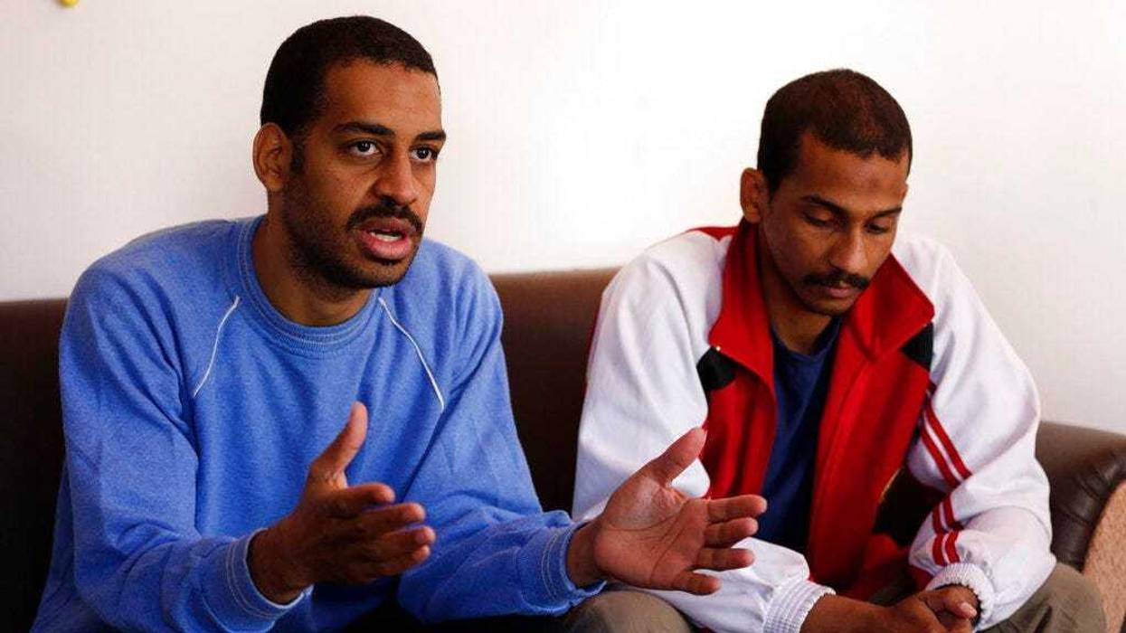 FILE - In this March 30, 2019, file photo, Alexanda Amon Kotey, left, and El Shafee Elsheikh, who were allegedly among four British jihadis who made up a brutal Islamic State Speak during an interview with The Associated Press. (AP Photo/Hussein Malla,Fi)