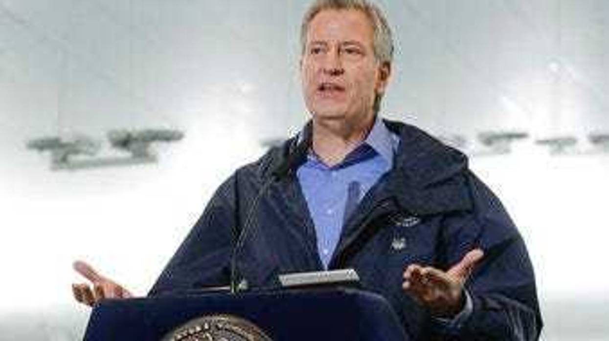 FILE - In this March 31, 2020 file photo, New York City Mayor Bill de Blasio speaks at the USTA Indoor Training Center where a 350-bed temporary hospital will be built in New York. (AP Photo/Frank Franklin II, File)