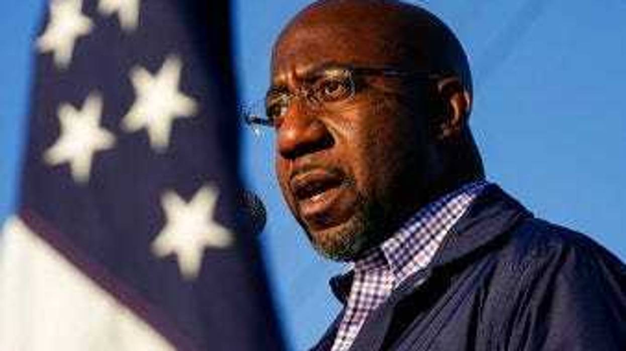 FILE - In this Nov. 15, 2020, file photo Raphael Warnock, a Democratic candidate for the U.S. Senate, speaks during a campaign rally in Marietta, Ga. (AP Photo/Brynn Anderson, File)