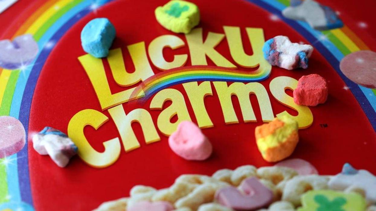 FILE - In this photo illustration, marshmallows from General Mills Lucky Charms cereal are displayed on a box on April 18, 2022 in San Anselmo, California. The U.S. Food and Drug Administration is investigating reports of hundreds of people that have fallen ill and have experienced symptoms of nausea, diarrhea and vomiting after eating Lucky Charms cereal.