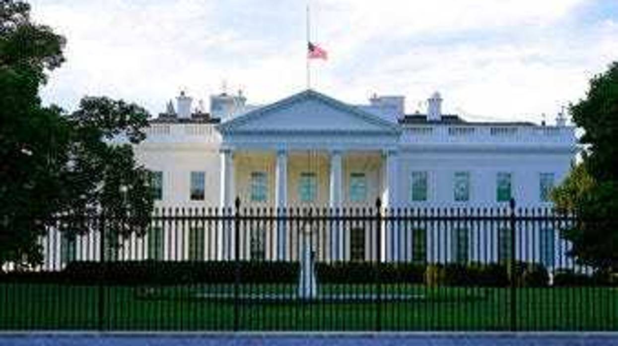 FILE - In this Saturday, Sept. 19, 2020, file photo, an American flag flies at half-staff over the White House in Washington. (AP Photo/Patrick Semansky, File)