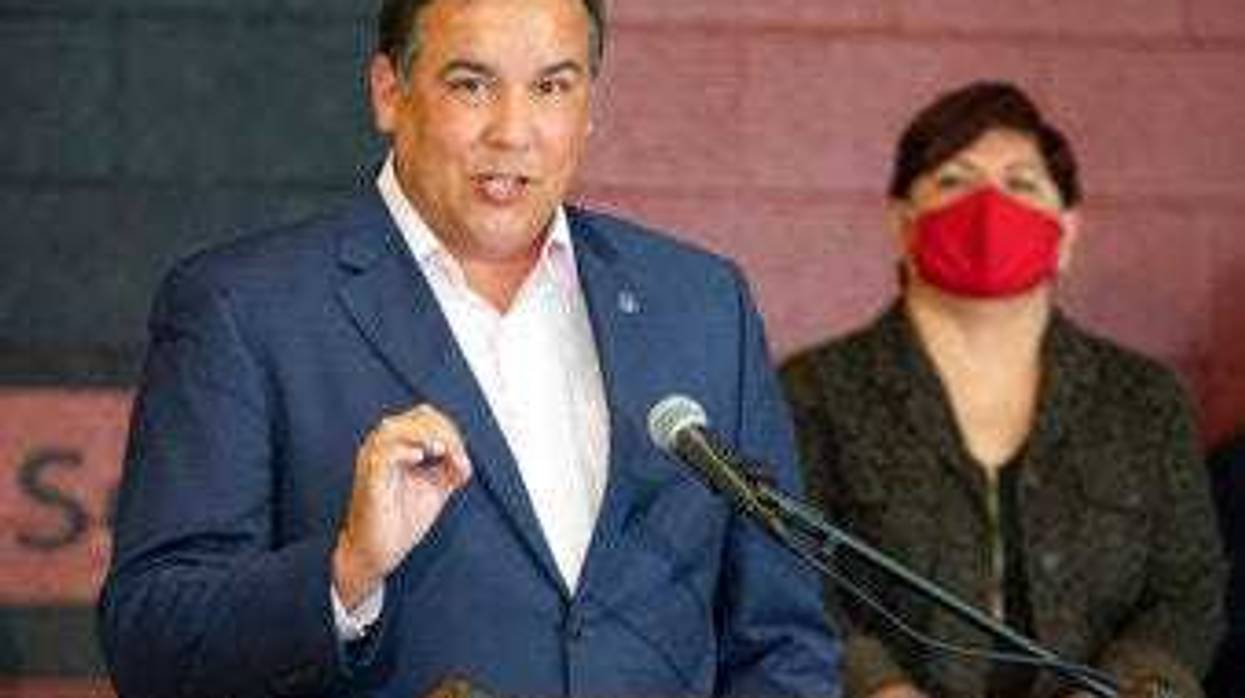FILE - In this Tuesday, July 28, 2020 file photo, Columbus Mayor Andrew Ginther makes remarks. (Adam Cairns/The Columbus Dispatch via AP, File)