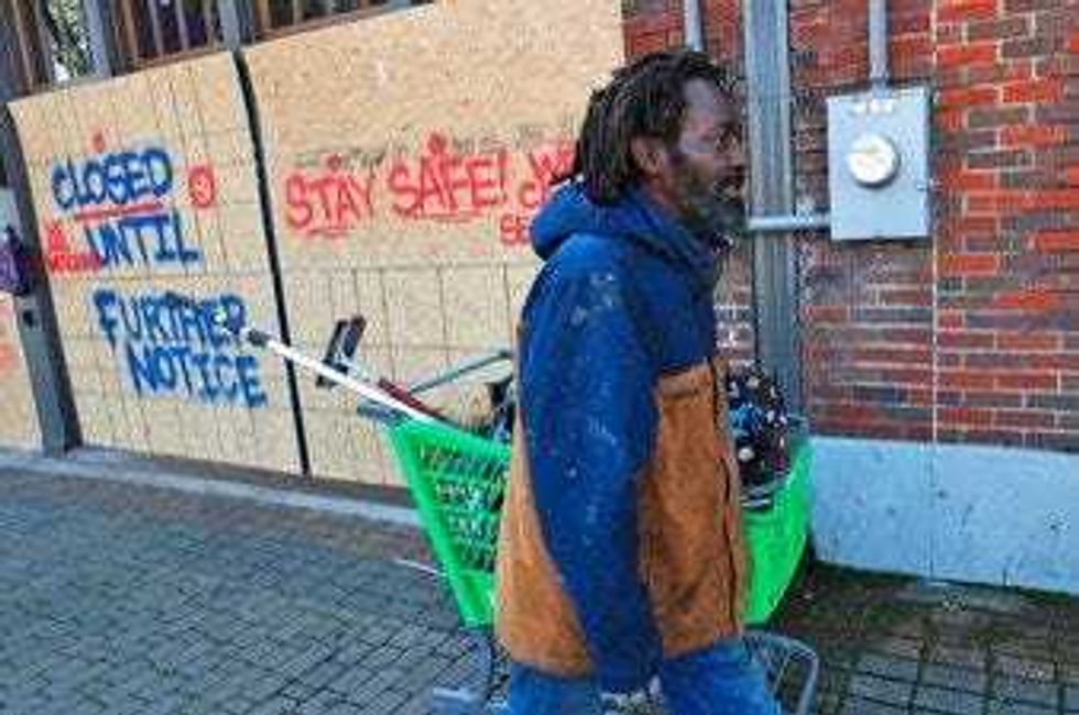 A Record 6.6 Million Seek U.S. Jobless Aid as Layoffs Mount