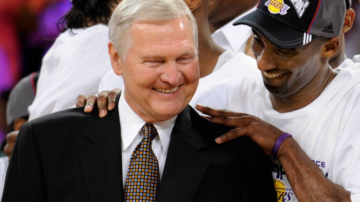 FILE - Los Angeles Lakers' Kobe Bryant gives basketball great Jerry West a shoulder rub after the Lakers beat the San Antonio Spurs in Game 5 of the NBA Western Conference basketball finals in Los Angeles, May 29, 2008. Jerry West, who was selected to the Basketball Hall of Fame three times in a legendary career as a player and executive and whose silhouette is considered to be the basis of the NBA logo, died Wednesday morning, June 12, 2024, the Los Angeles Clippers announced. He was 86.