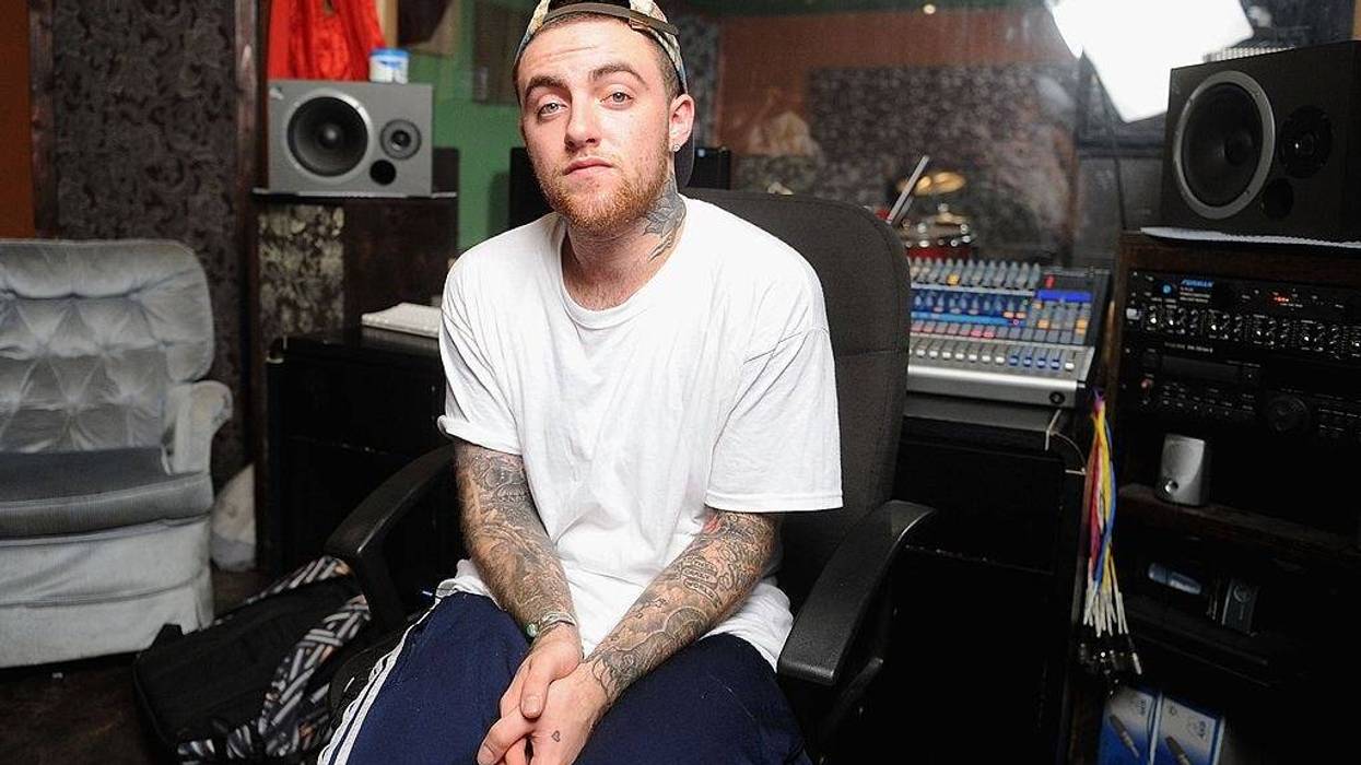 FILE - MAC Miller performs during Behind The Scenes With MAC Miller Filming Music Choice's "Take Back Your Music" Campaign at Music Choice on July 17, 2013 in New York City.