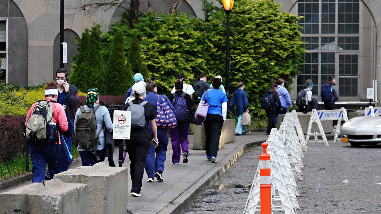 File photo: Medical staff arrive for their shift at NewYork-Presbyterian Hospital/Weill Cornell Medical Center