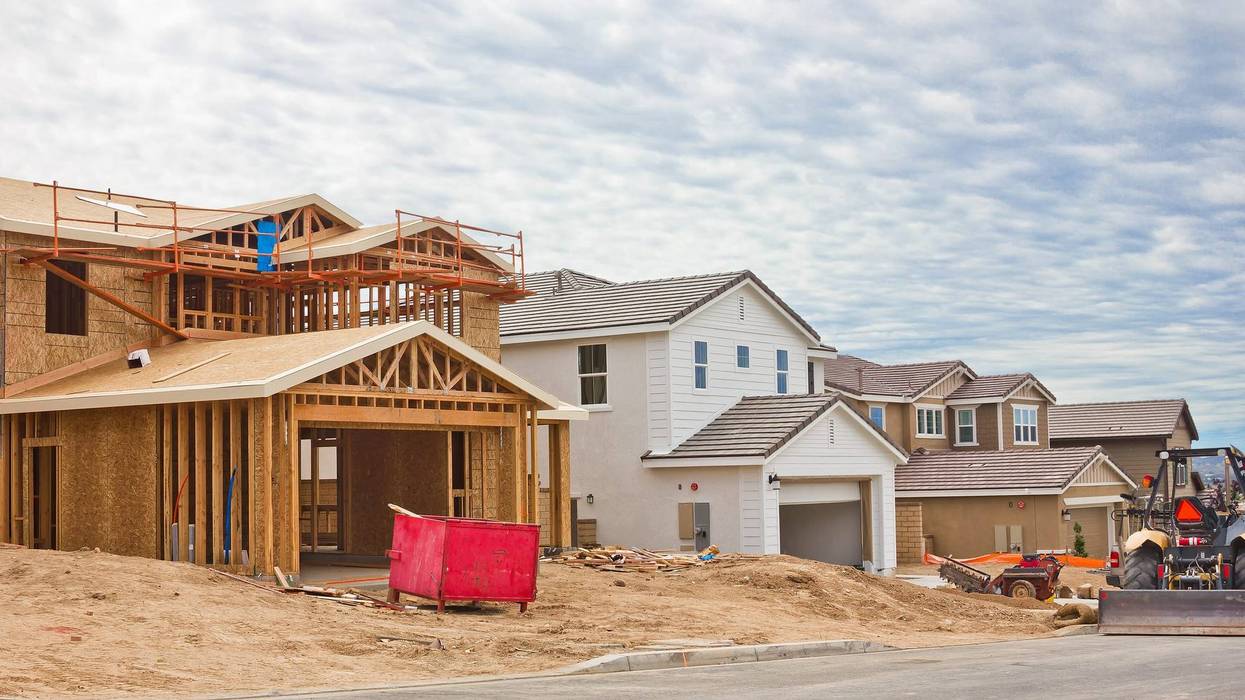 File photo of track homes completed and incomplete on a construction site.