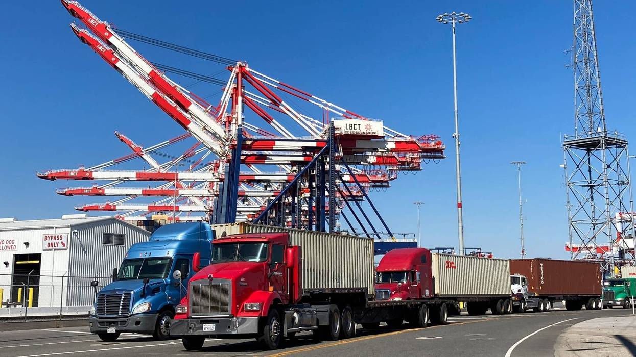 File photo of trucks lined up to enter one of the terminals at the Port of Long Beach. Supply chain issues have caused shortages of goods throughout the country with cargo ships waiting off shore in Southern California to off-load.